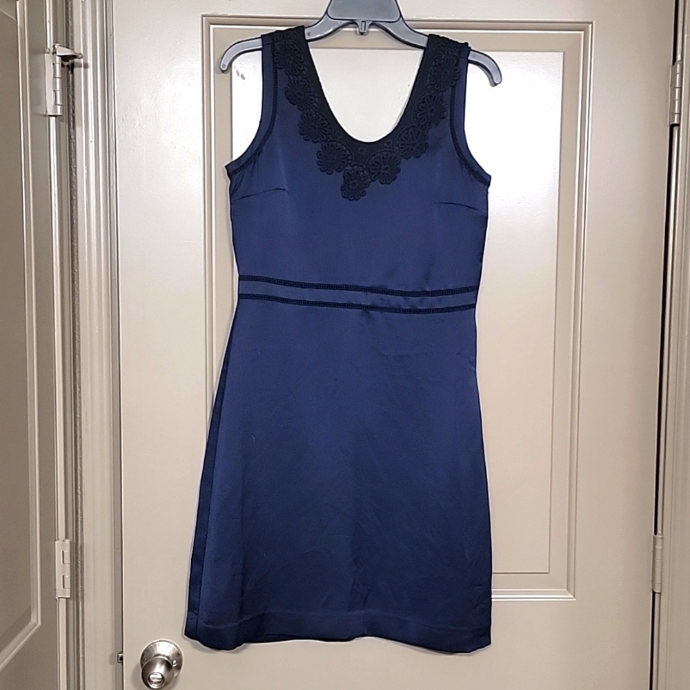 Satiny navy dress with black trim
